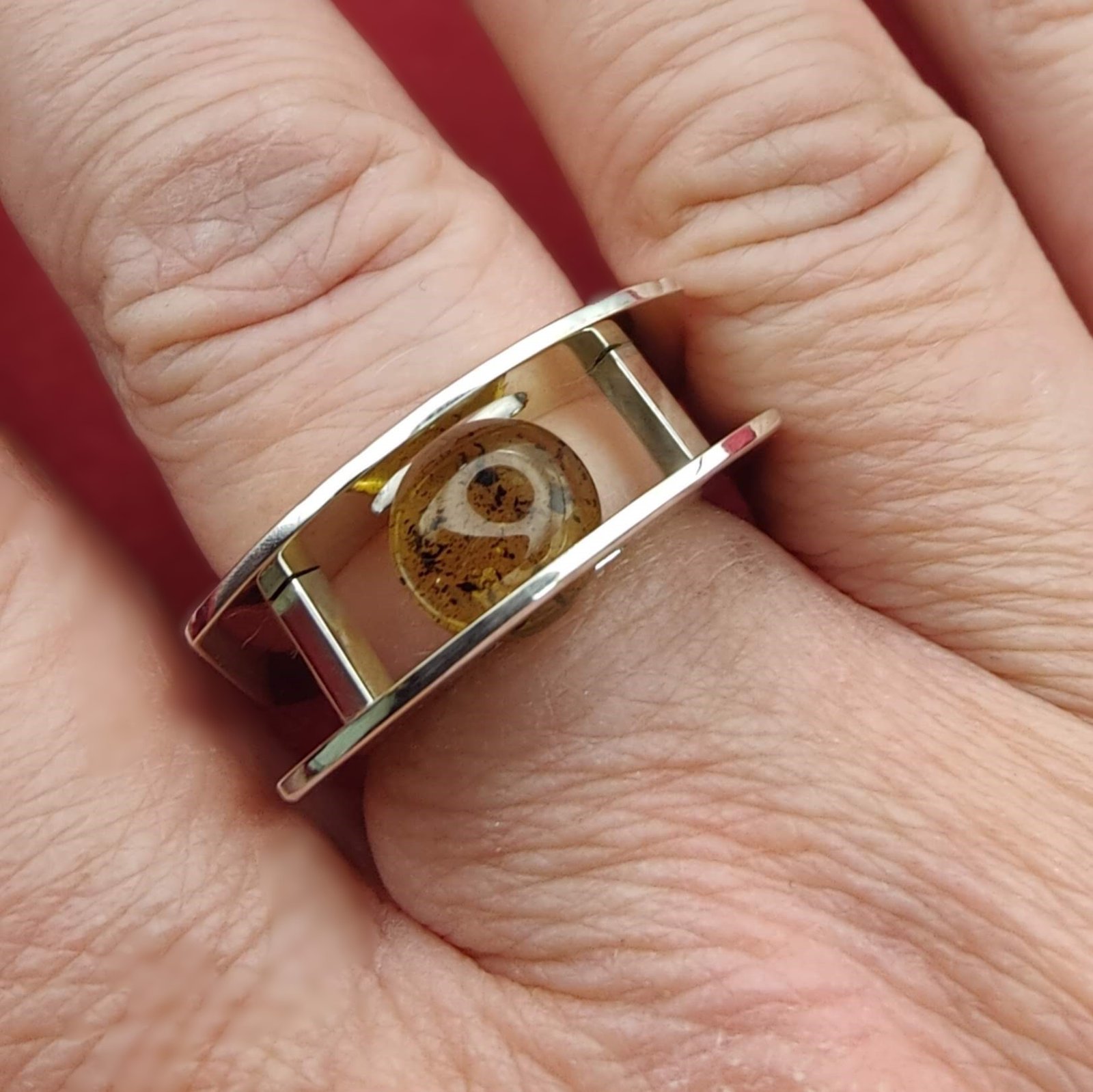 Suspension Ring No. 2 worn on the hand