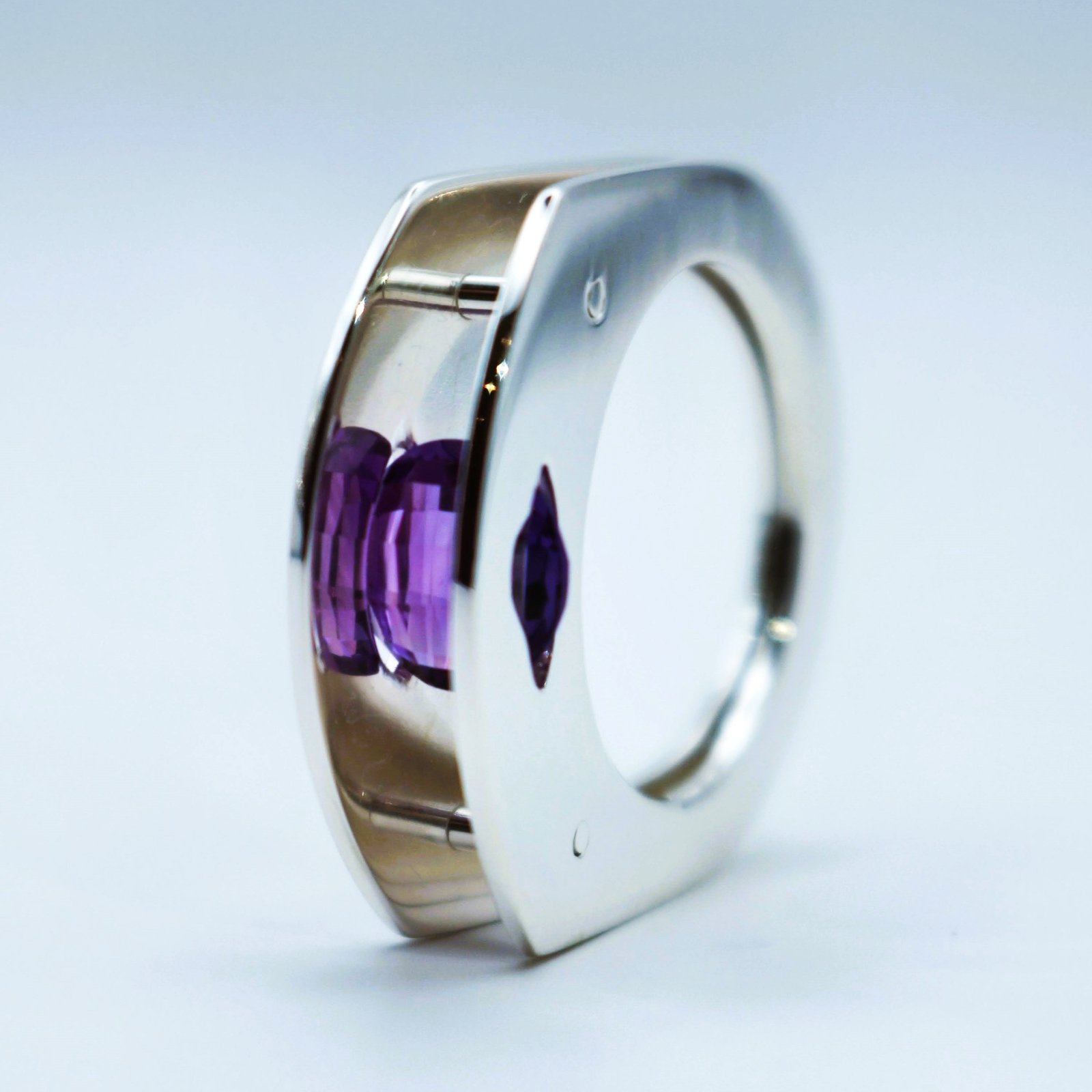 Detail of the amethyst reflecting on the silver interior
