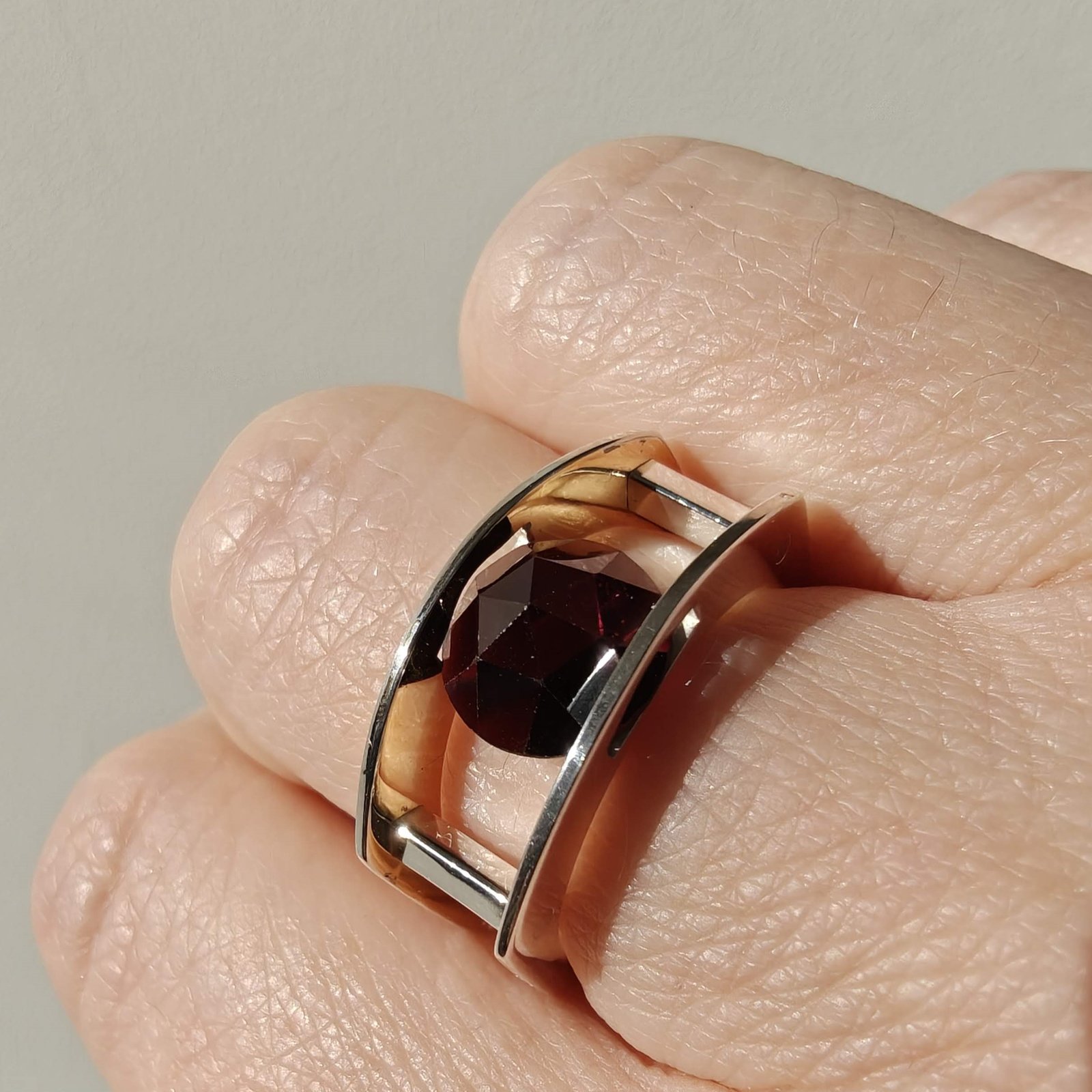 Suspension Ring No. 5 worn on the hand