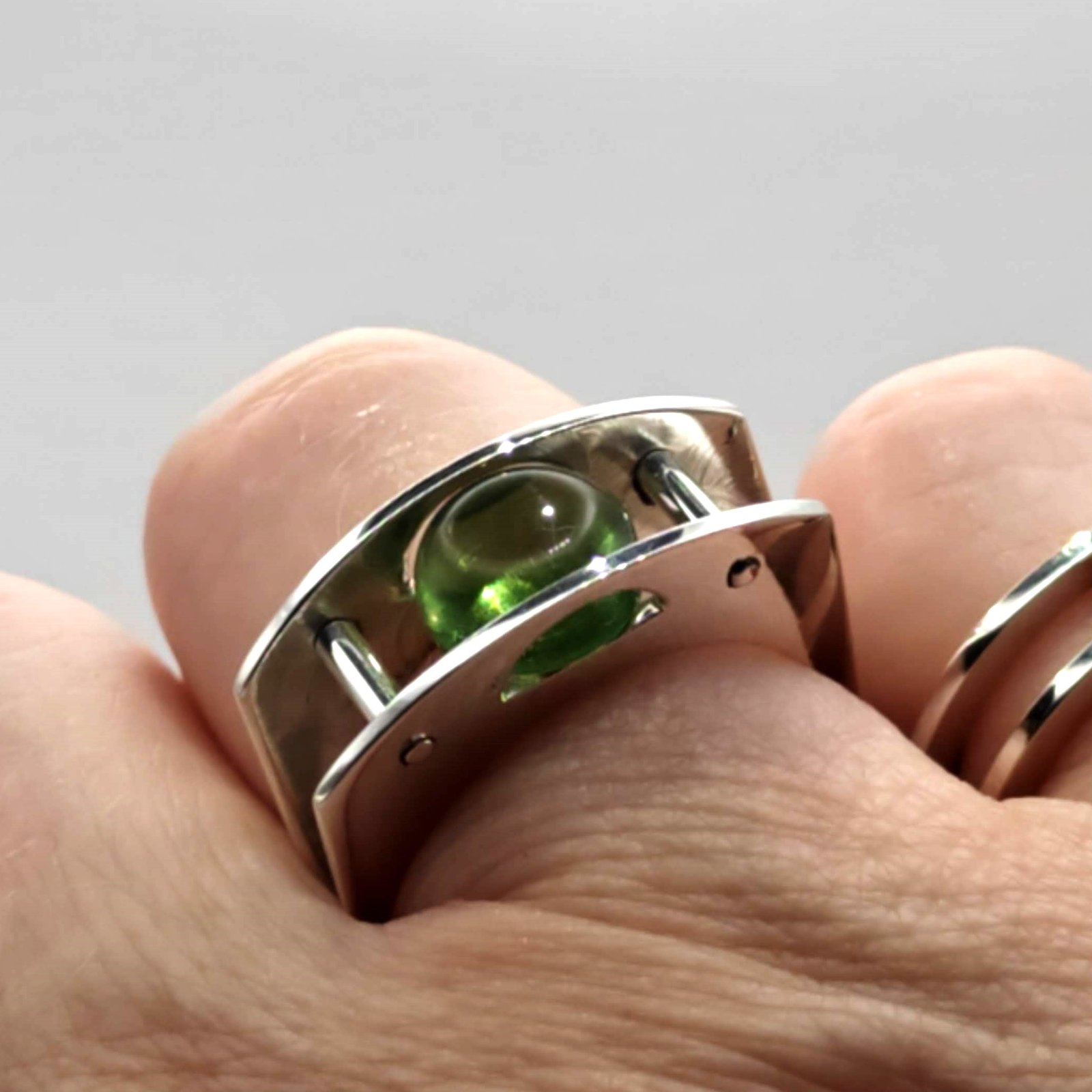 Suspension Ring No. 8 worn on the hand