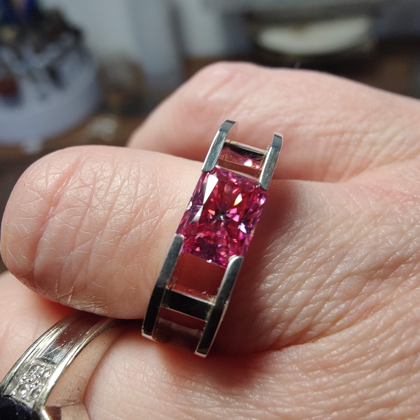 Suspension Ring No. 4 worn on the hand