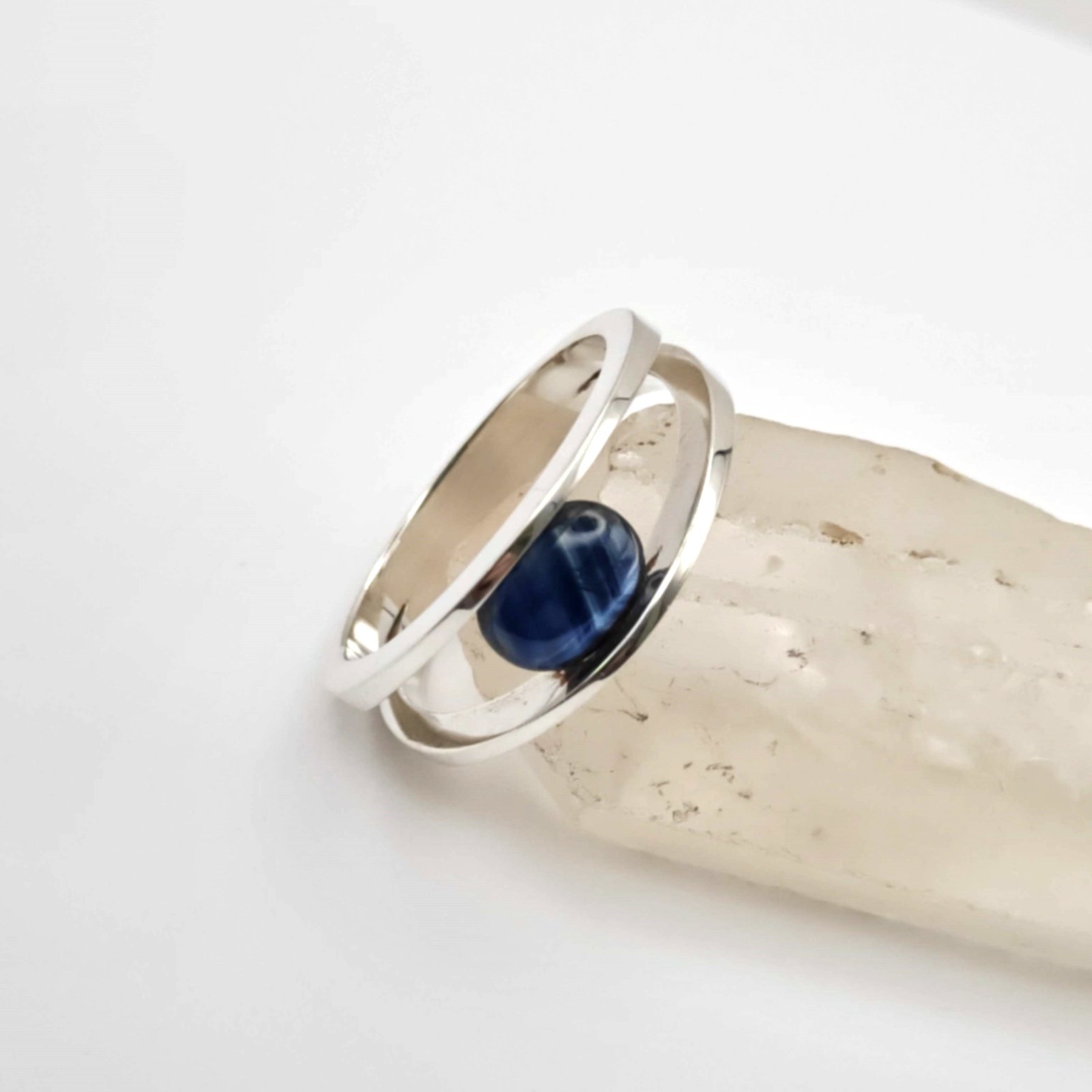 Detail of the sapphire in the silver tension setting