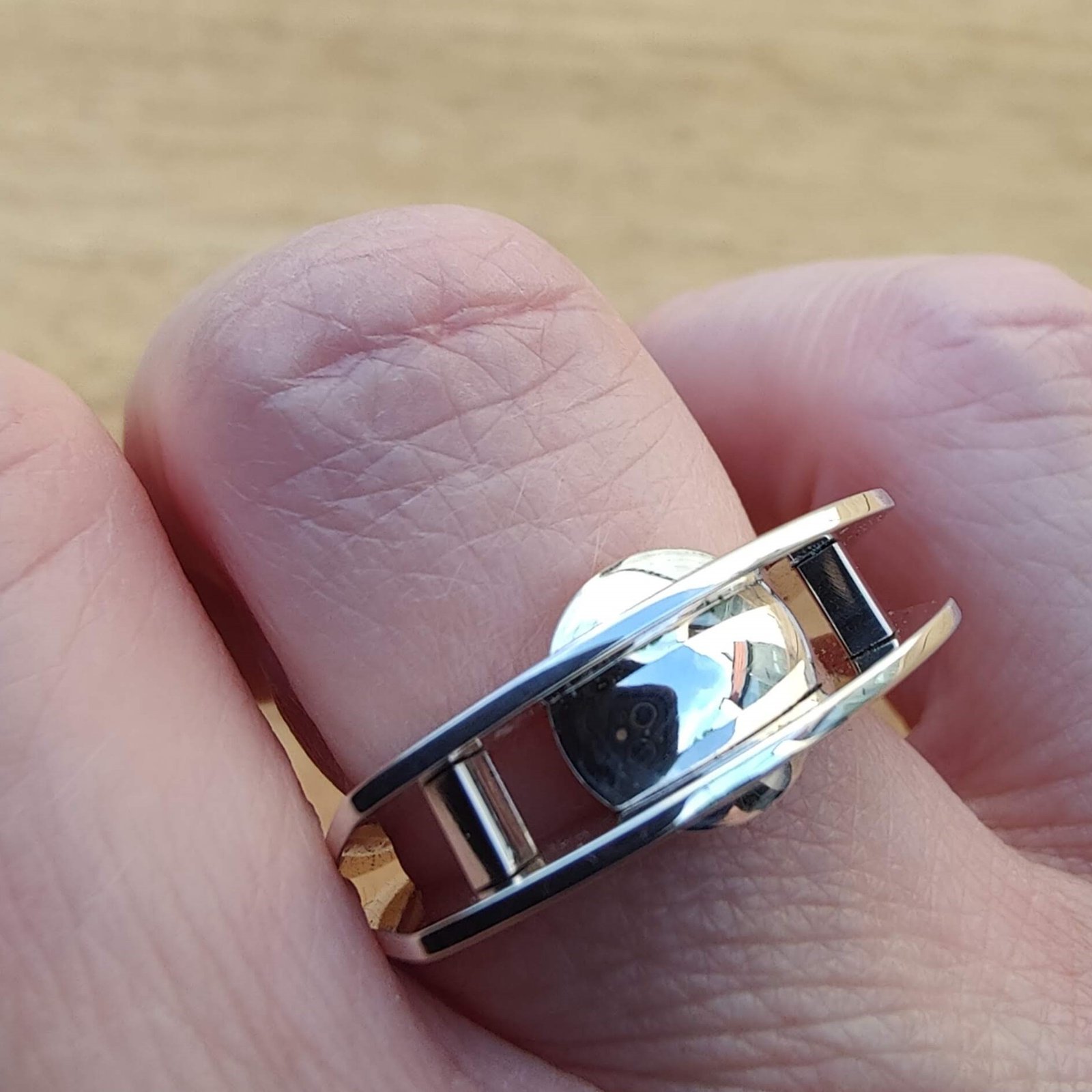 Suspension Ring No. 7 worn on the hand