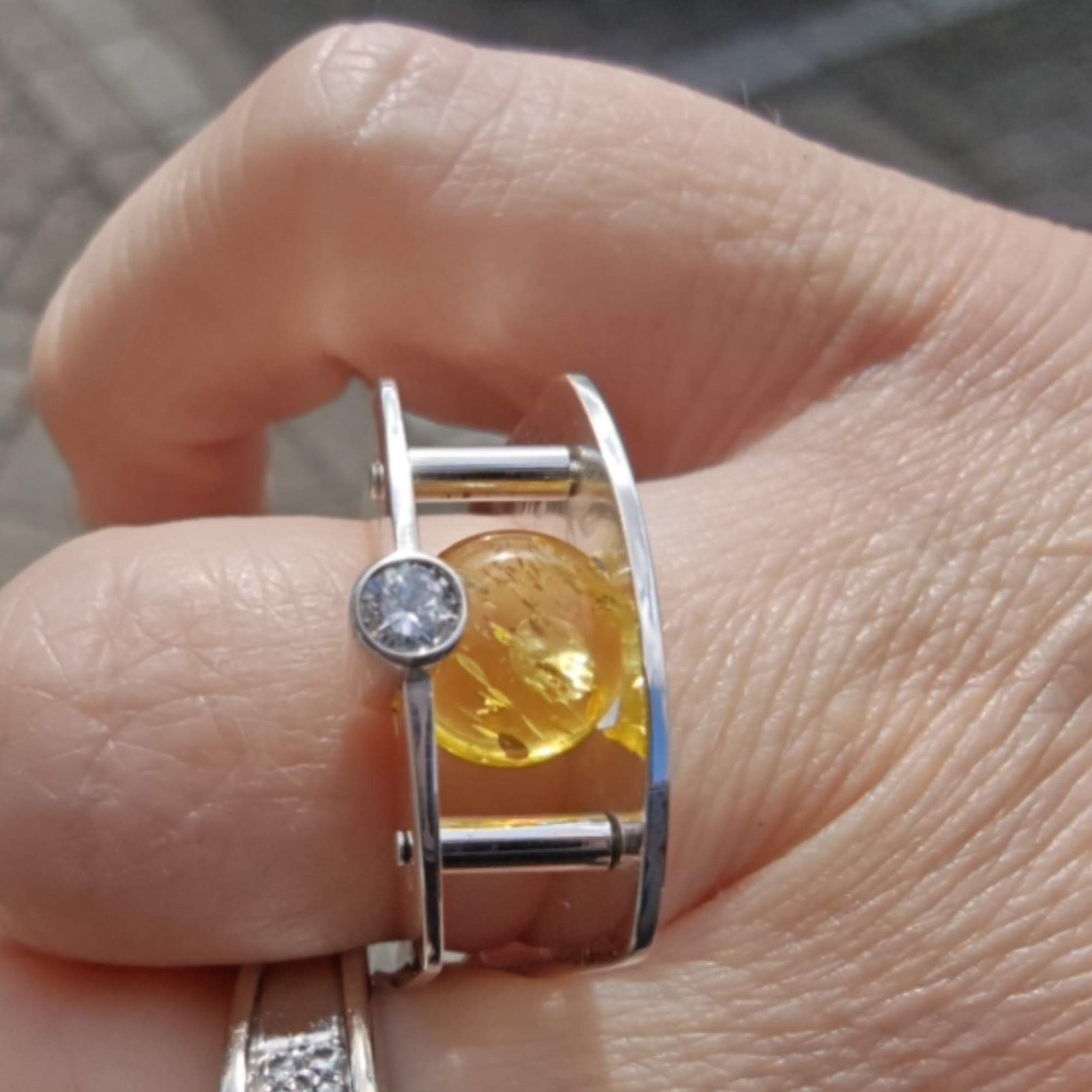 Suspension Ring No. 9 worn on the hand